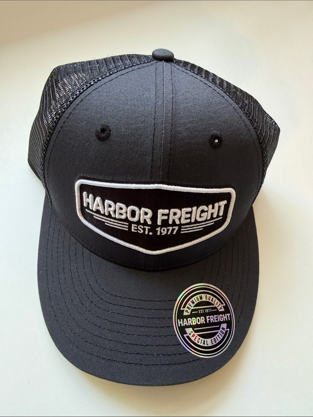 Black Trucker Hat - Embroidered Logo